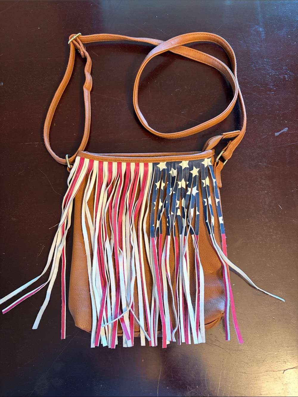 Claire's Brown Crossbody Bag with Red, White & Blue Fringe